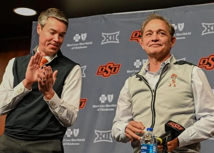 Who is the new wrestling coach of Oklahoma State, succeeding John Smith, and what is his achievement?